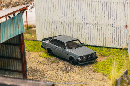 Tarmac Works 1/64 Volvo 242 Custom Grey - ROAD64