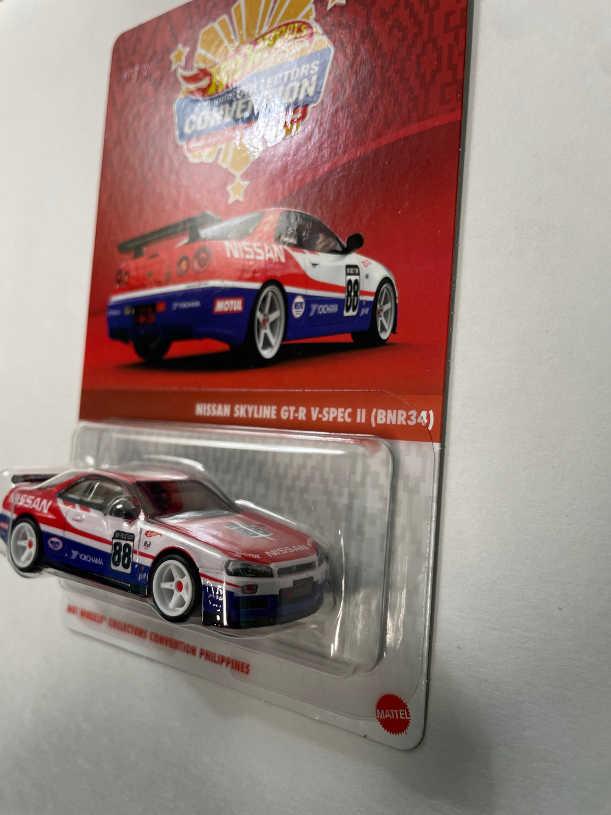 Hot Wheels 1/64 Collectors Convention Philippines 2026 Nissan Skyline GT-R V-Spec II (BNR34) #710 Red/ Blue - JKC11-0910