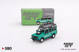 Mini GT 1/64 Land Rover Defender 110 1985 County Station Wagon Trident Green