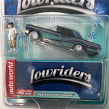 1/64 Auto World 1962 Chevrolet Impala Lowriders w/ Lowrider enthusiast Figure Blue