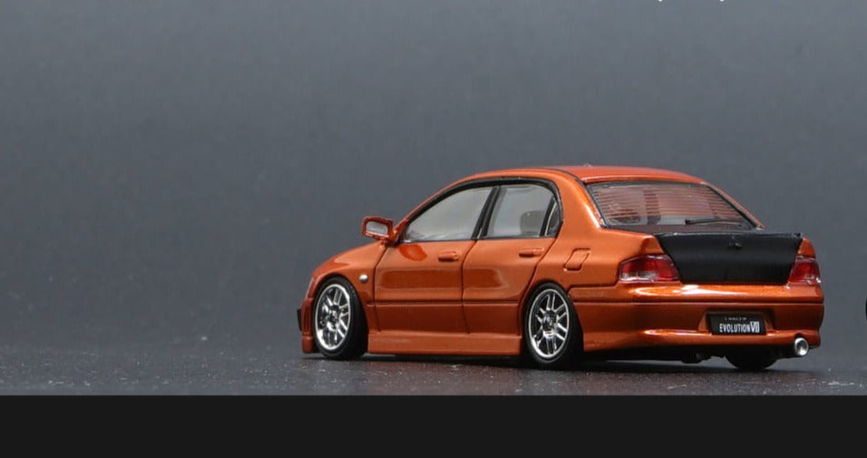 BM Creations 1/64 Mitsubishi Lancer Evolution VII Custom Orange w/ Decals & Extra Wheels