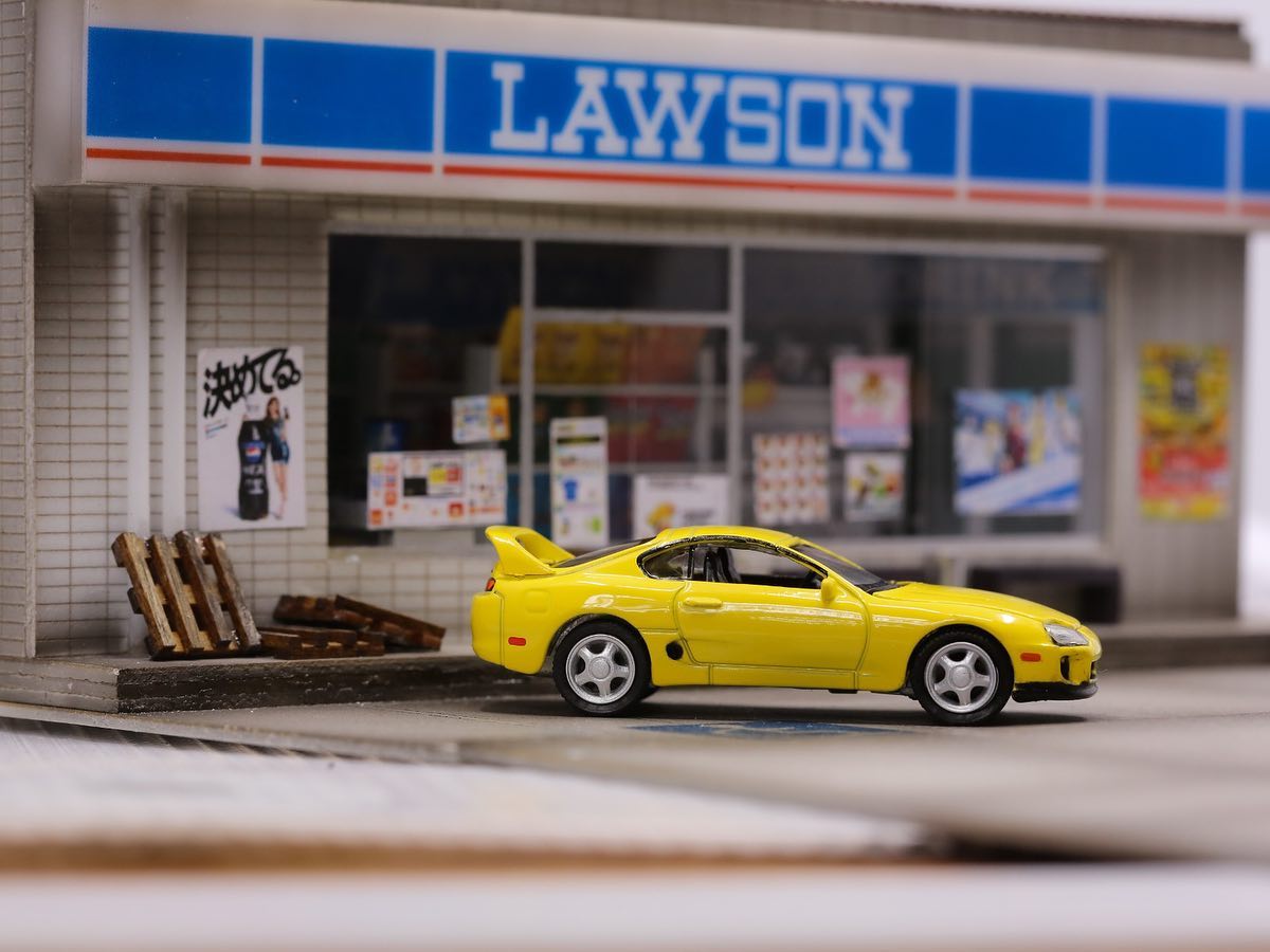 Auto World 1/64 1996 Toyota Supra Yellow Asia Special Edition