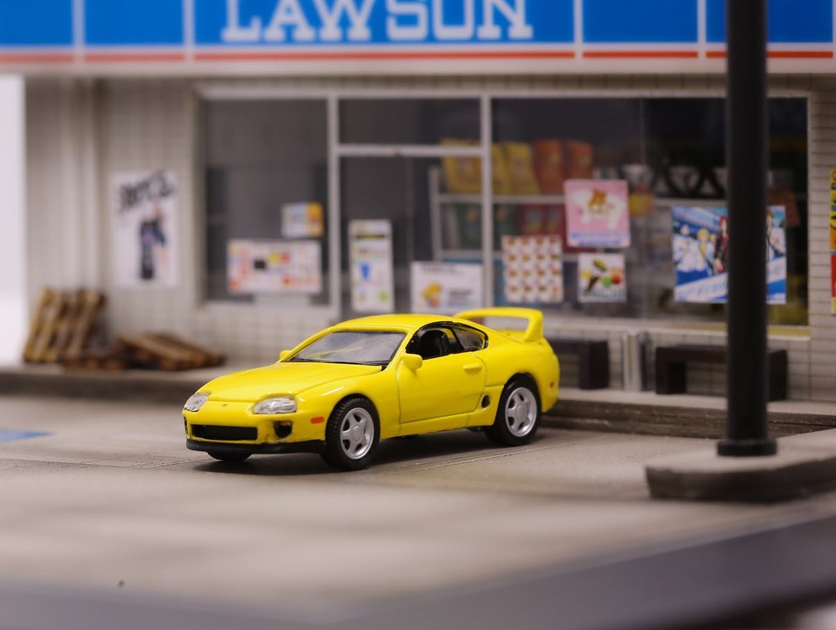 Auto World 1/64 1996 Toyota Supra Yellow Asia Special Edition