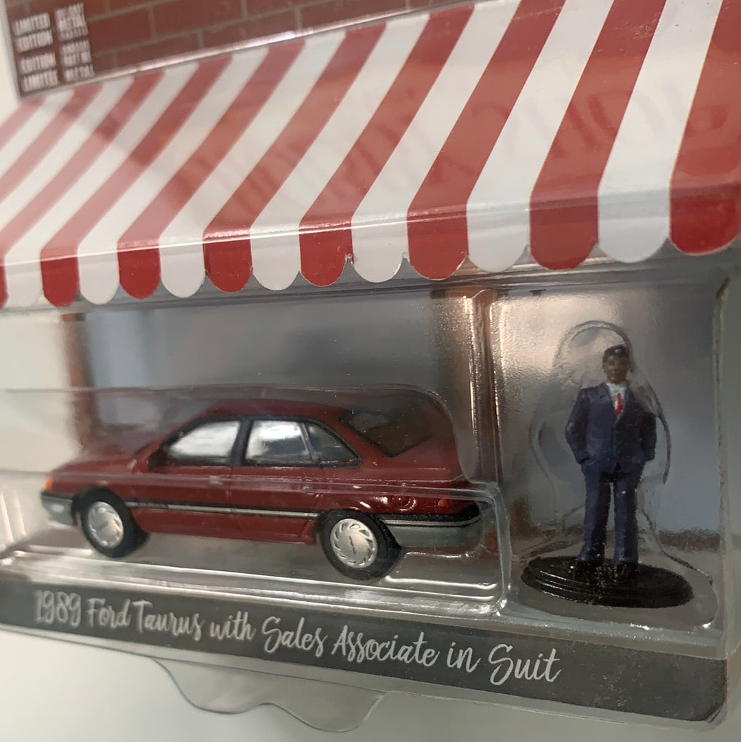 Greenlight 1/64 1989 Ford Taurus Red w/ Sales Associate in Suit