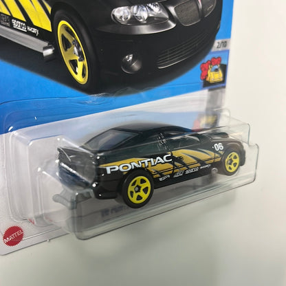 Hot Wheels 1/64 ‘06 Pontiac GTO Black - Damaged Card